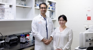 Study authors Sunil A. Sheth, MD, with McGovern Medical School at UTHealth Houston, and Youngran Kim, PhD, with UTHealth Houston School of Public Health, in the lab. (Photo by Rogelio Castro/UTHealth Houston)